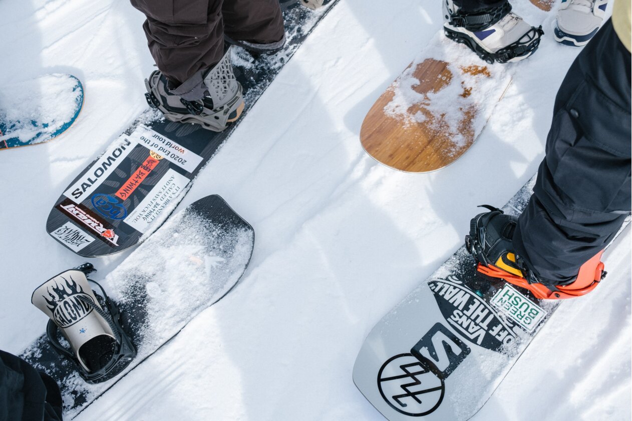 Close-up of four snowboards in the snow. | © Salomon