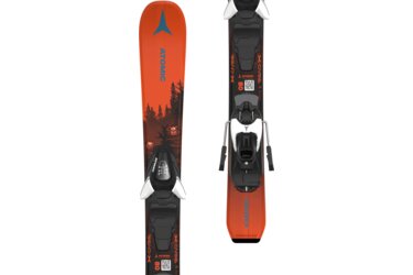 Two Atomic skis, orange with black bindings.