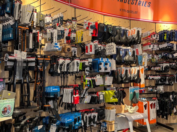 Bike shop interior with KTM logo and accessories.